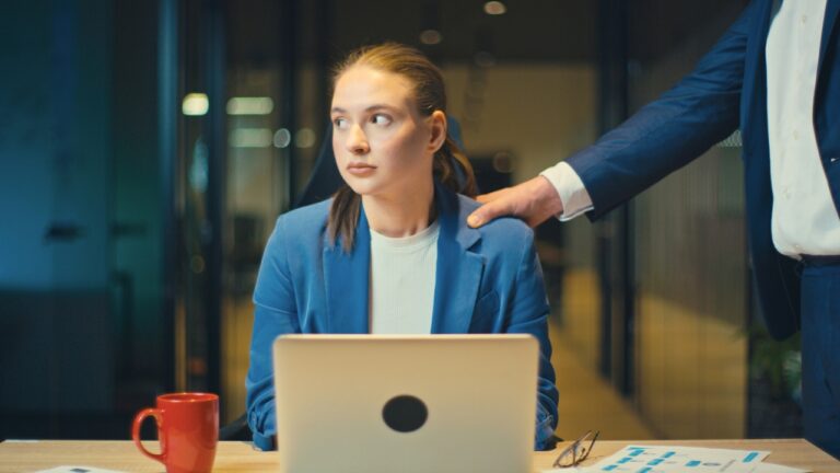 New Employee Says Her Workplace Mentor Called Her a “Naughty Girl,” Boxed Her In at Work, and Kept Pushing Her To Confide in Him