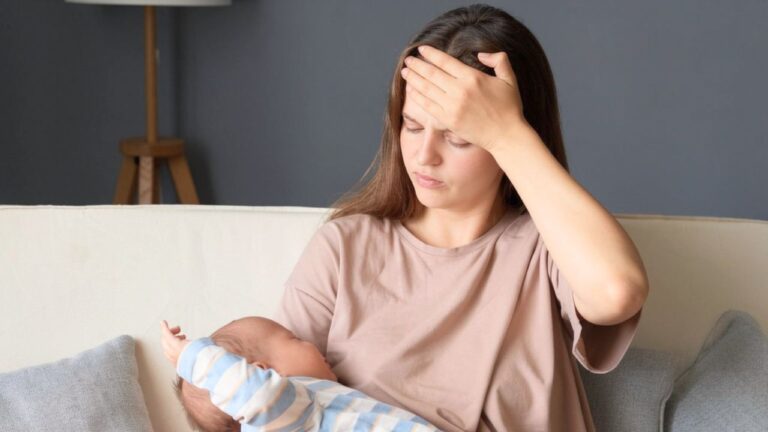 Woman says she spent the night dry heaving with a brutal headache — then her husband still left her alone with a toddler and a baby