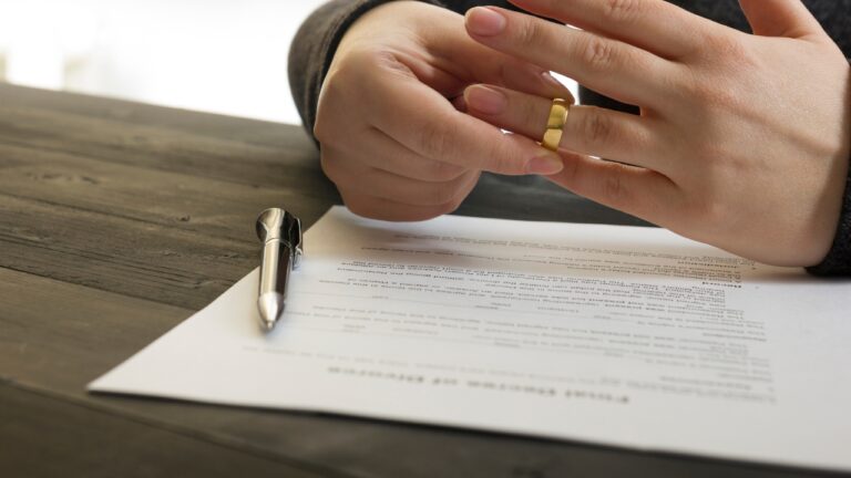 Woman says her husband went to prison, his family threw her belongings onto the street, and that was when she finally filed for divorce