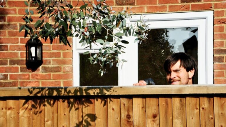 Resident Says Neighbor Videotaped Them Inside the House — Then Reddit Said Curtains Might Be the First Defense